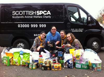Carluke Scouts delivering donation to the Scottish SPCA